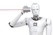 A futuristic-looking robot holds a tin can connected to a string.