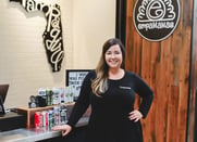 Empamamas owner-operator Stephanie Swanz stands in her food hall restaurant.